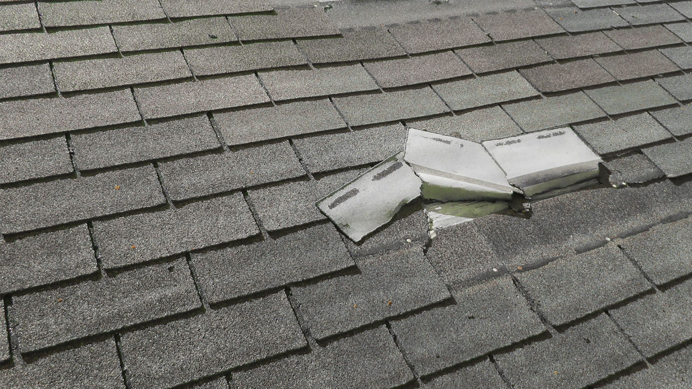 Spot the Signs of Wind Damage to your Roofing System - In Awe Roofing